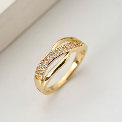 Elegante Goudkleurige Crossover Ring met Steentjes